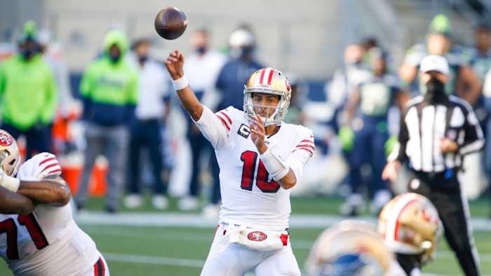 San Francisco 49ers quarterback Jimmy Garoppolo (10) passes against the Seattle Seahawks during the second quarter at CenturyLink Field.